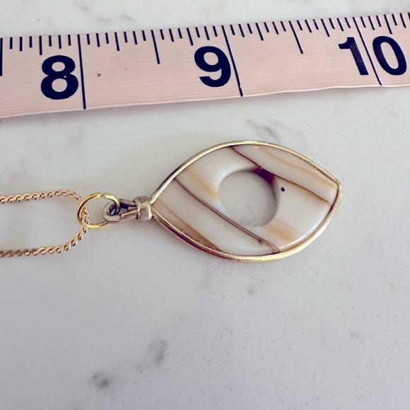 Cream and brown gold tone metal wrapped pendant on gold tone necklace - Picture 5 of 6